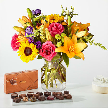 Bouquet du meilleur jour et paquet de chocolat