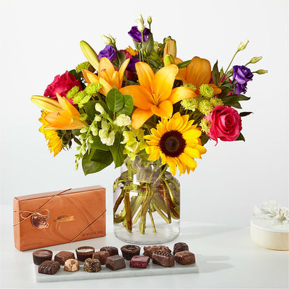 Bouquet du meilleur jour et paquet de chocolat