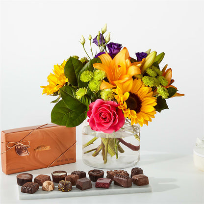 Bouquet du meilleur jour et paquet de chocolat