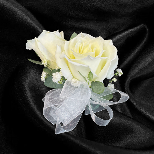 Double Rose Corsage – pink, red, white flower arrangement