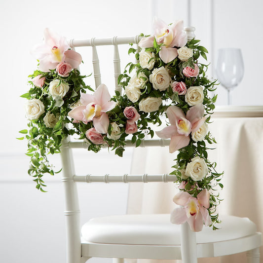 Decoración de silla rosa orquídea