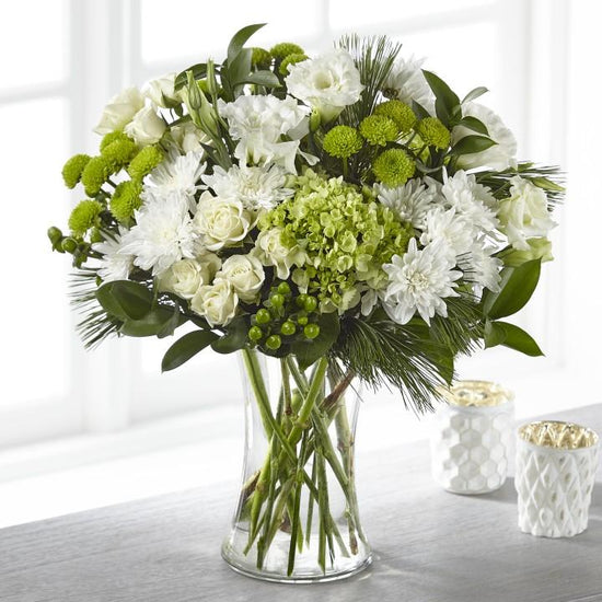 Our Thoughtful Sentiments Bouquet offers symbolic white and green flowers to share your reverence. This stunning arrangement is crafted with hydrangea, lisianthus and spray roses to serve as a thoughtful reminder of your support and love. 