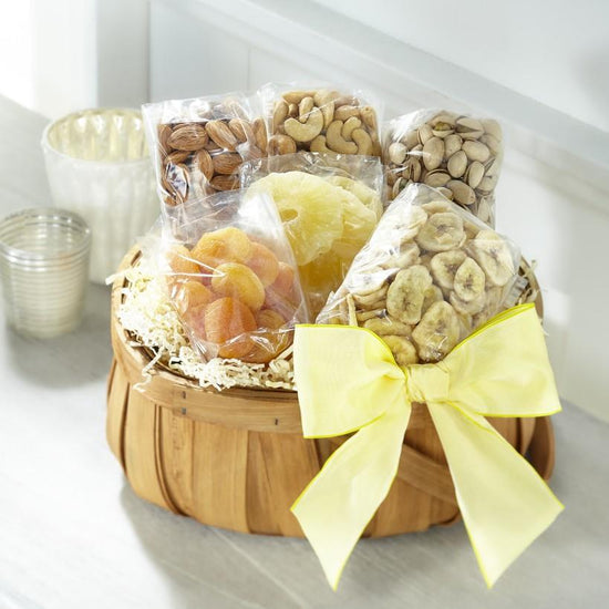 Our charming basket comes filled to the brim with a wide variety of nuts and dried fruits. The basket is finished with a yellow ribbon, making it a thoughtful gift from the heart.