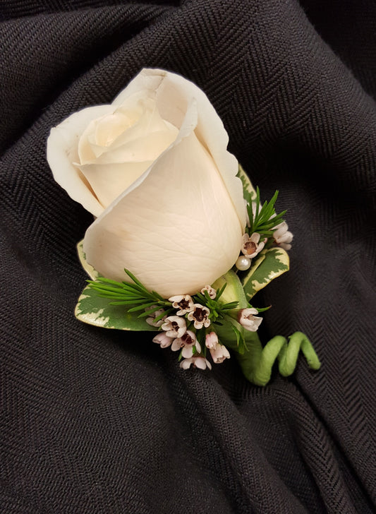 FOR PICK UP ONLY IN OUR LOCAL TARZANA, CA LOCATION  - Please call 818 344-8400 to place your order.  A Boutonniere with a fresh rose any choice of color.  Please specify rose color in special instructions at checkout.
