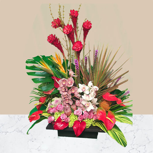This stylish, show stopping piece, featuring colorful exotic flowers is the perfect gift for any person or client! Brighten up any room or office with a tropical touch, sure to put the room in awe!